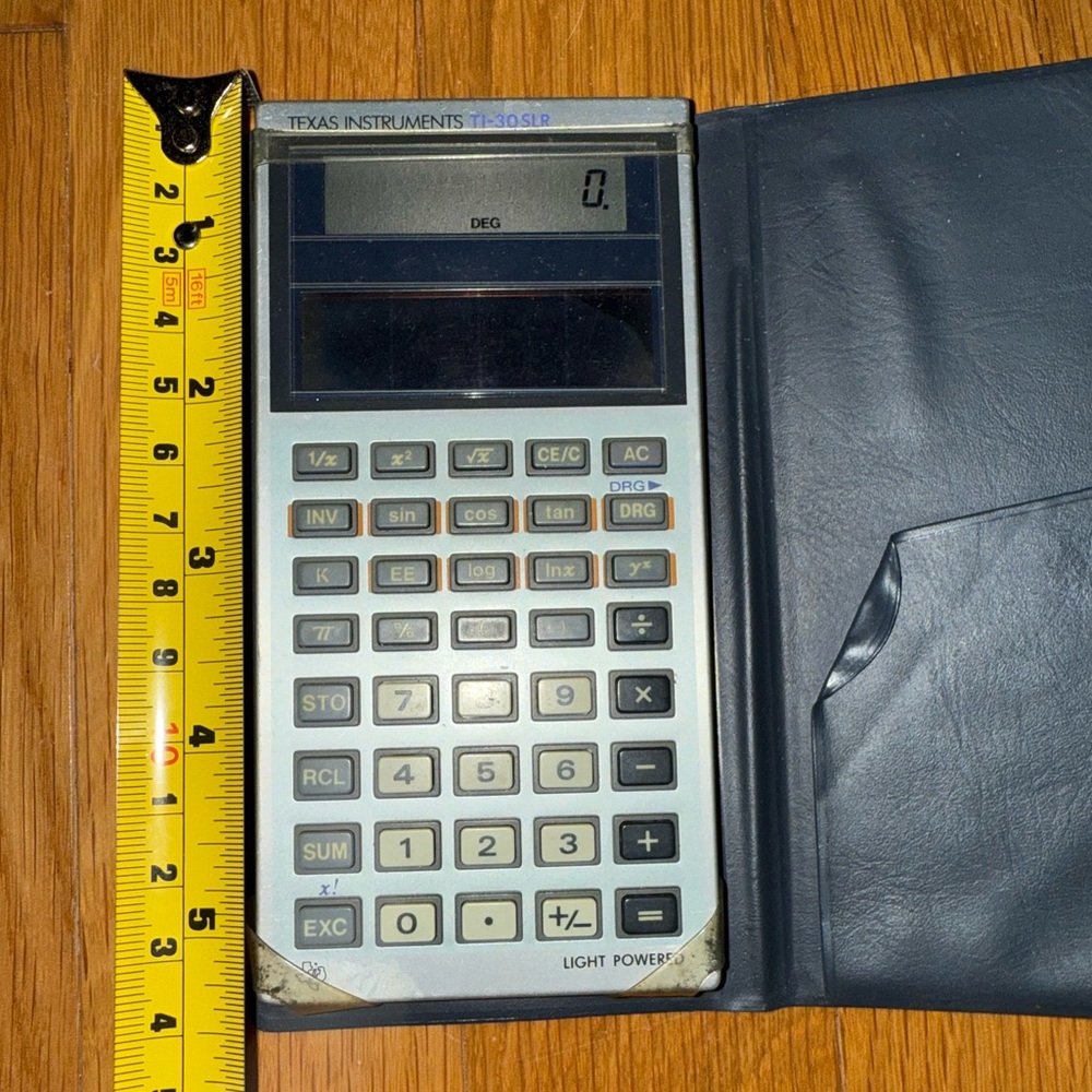 Vintage Texas Instruments TI-30SLR light powered calculator w/navy blue case